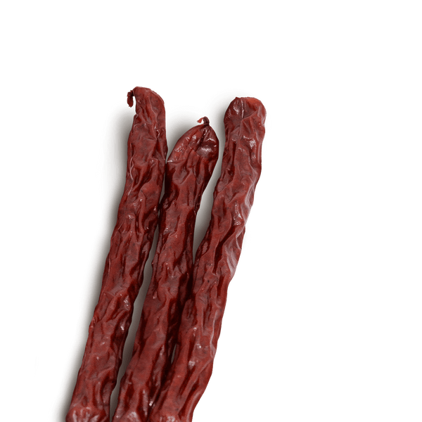 Three beef sticks on transparent background. 