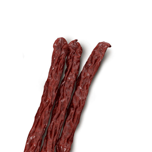 Three beef sticks on a transparent background. 