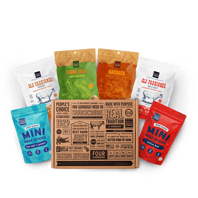 Collection of jerky packages with a branded beef jerky box. 