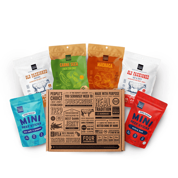 Collection of jerky packages with a branded beef jerky box. 