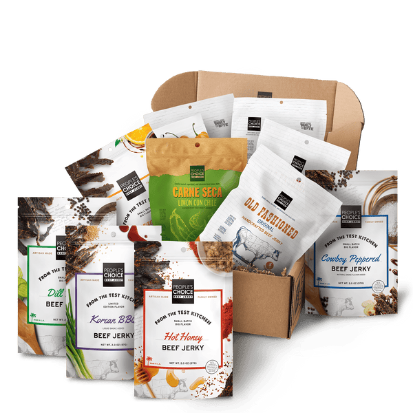 Branded box with assortment of beef jerky bags in it while against a transparent background. 