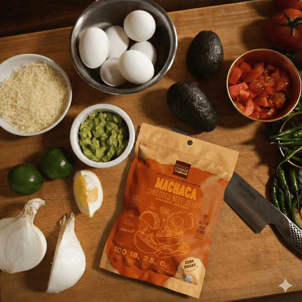 Wooden cutting board with ingredients and a package of Machaca shredded beef jerky.