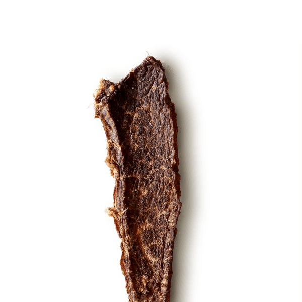Piece of Old Fashioned Beef Jerky on white background 