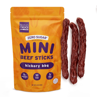 Orange package of People's Choice Zero Sugar Mini Beef Sticks Hickory BBQ flavor with three sticks displayed.