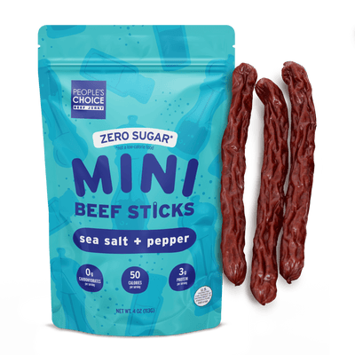 Turquoise package of People's Choice Mini Beef Sticks with sea salt and pepper flavor, featuring three sticks on a white background.