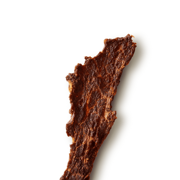 Close-up of a textured, beef jerky piece on a transparent background